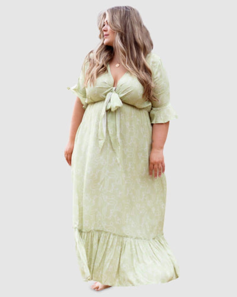 Front of a model wearing a size 20 Nicole Tie Front Maxi Dress in Olive Cactus Print by Dani Marie. | dia_product_style_image_id:258063